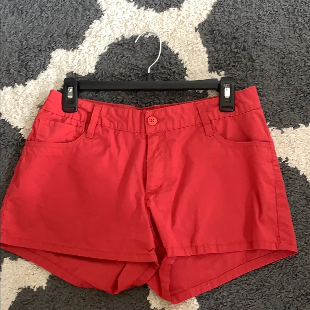 red shorts